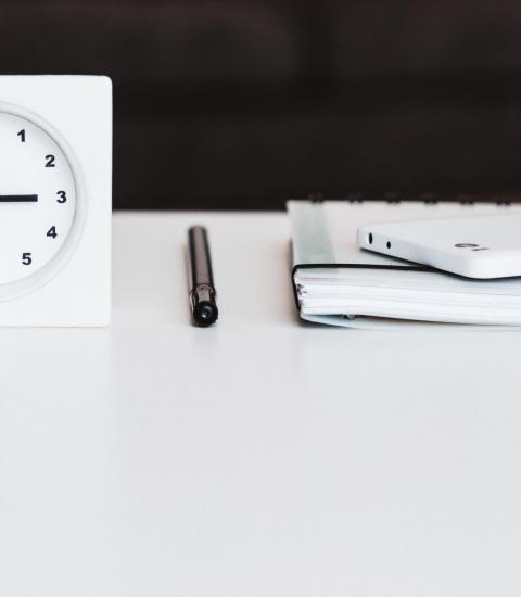 Clock, pen, journal